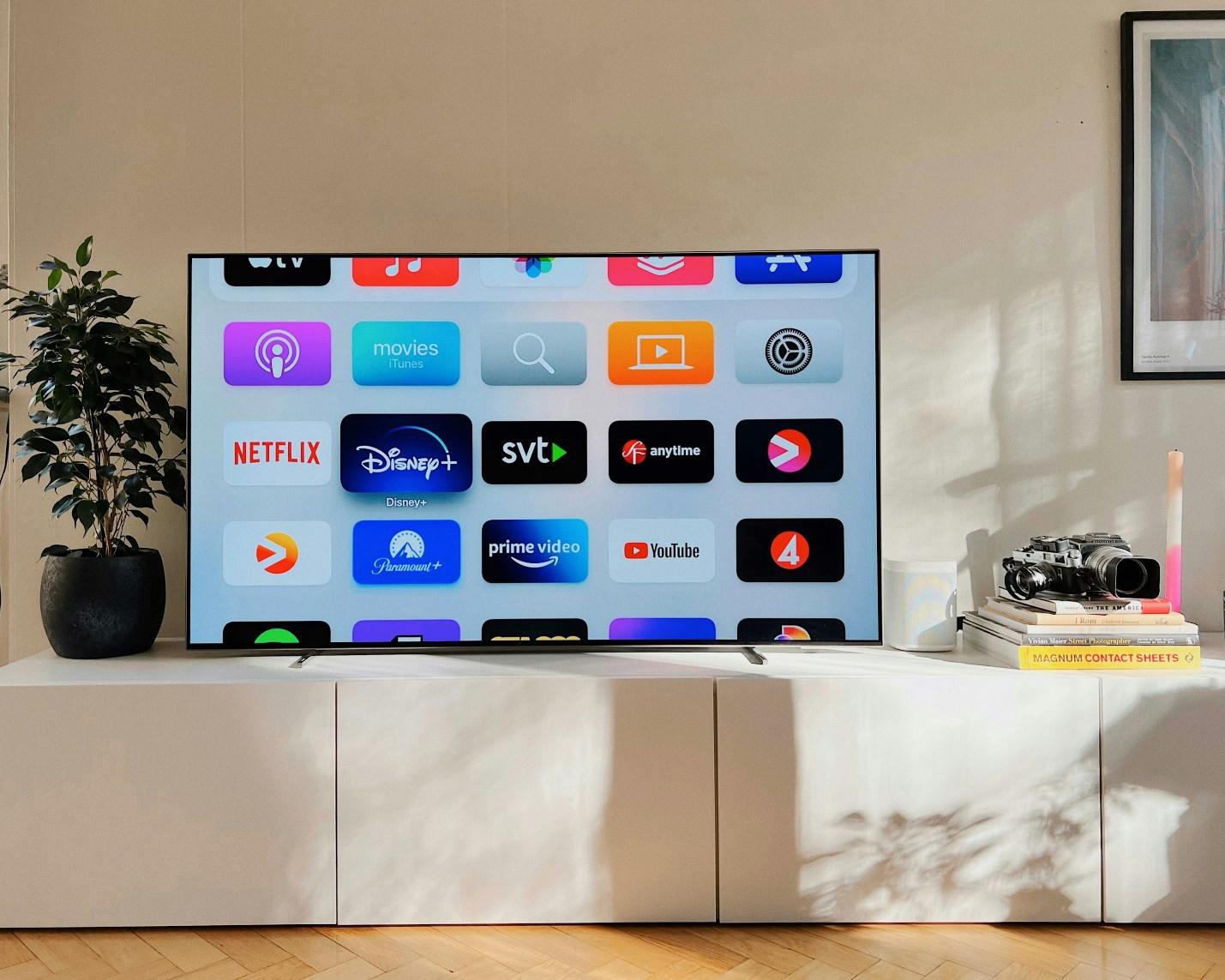 an LED TV displaying a number of apps